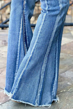 Load image into Gallery viewer, Light Blue Acid Wash Raw Hem Flared Jeans
