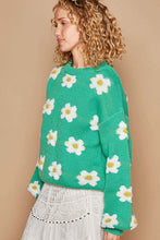 Load image into Gallery viewer, Woman wearing green daisy drop shoulder sweater, winter clothes, cozy women&#39;s winter clothes, long sleeve oversized fit, quirky style.
