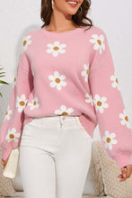 Load image into Gallery viewer, Woman wearing pink flower sweater with round neck and dropped shoulders, perfect women&#39;s winter clothes for a playful look
