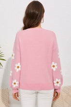 Load image into Gallery viewer, Woman wearing pink flower sweater with round neck and dropped shoulder design, back view. Ideal for winter clothes and women&#39;s winter fashion.
