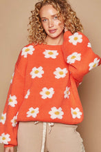 Load image into Gallery viewer, Woman wearing orange drop shoulder Daisy Sweater with playful daisy design and relaxed fit, perfect for women&#39;s winter clothes.
